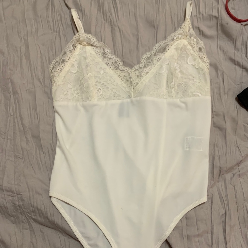 Sheer white lace body suit